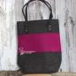 Preview: Große pinke Shoppertasche aus Filz mit stabilen Metallnieten an den Henkeln, handgefertigt, vor weißem Hintergrund.