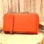 Preview: Hochwertige unisex Umhängetasche / Geldbeutel in Orange mit abnehmbarem Schultergurt.