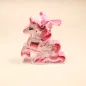 Preview: Einhorn-Frisier-Zauber-Box mit Haarspangen, Haargummis & Ring, rosa Glitzer-Accessoires, transparente Verpackung, Einhorn-Form.