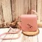 Preview: Rosa Kindertasche mit aufgesticktem Hippo-Pony Gesicht und verstellbarem Schultergurt.