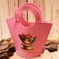 Preview: Handgenähte rosa Kindertasche aus Filz mit gepresstem Feen-Motiv, runden Griffen und kleiner Schleife der Marke weidräwöl.