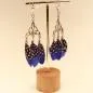 Preview: Handgefertigter Modeschmuck mit Hasenmotiv aus versilbertem Metall.