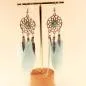 Preview: Handgefertigter Modeschmuck mit Hasenmotiv aus versilbertem Metall.