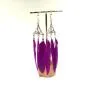 Preview: Handgefertigter Modeschmuck mit Hasenmotiv aus versilbertem Metall.