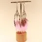 Preview: Handgefertigter Modeschmuck mit Hasenmotiv aus versilbertem Metall.