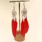 Preview: Handgefertigter Modeschmuck mit Hasenmotiv aus versilbertem Metall.