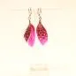 Preview: Handgefertigter Modeschmuck mit Hasenmotiv aus versilbertem Metall.