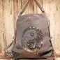 Preview: Grauer Rucksack aus Stoff mit silbernem Ying & Yang Symbol aus Pailletten, Lederboden und gestreiften Gurten, 3-in-1 Funktion als Handtasche.