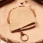 Preview: Schlüsselanhänger Löwe gehäkelt mit brauner Stoffschnur und Schlüsselring zum Verstecken von Schlüsseln
