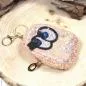 Preview: Detailansicht der glitzernden Utensilientasche mit Schlüsselring (Gesamthöhe 17 cm).