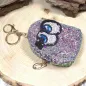 Preview: Glitzerndes Schlüsselanhänger Mäppchen in Hellblau mit buntem Augen-Motiv
