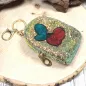 Preview: Gelbes Glitzer Schlüsselanhänger Mäppchen mit Kirschen Motiv, geschlossen.