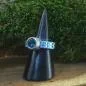 Preview: Damenring mit Strass-Band hellblau und Swarovski-Stein schmal