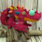 Mobile Preview: Stofftier Dinosaurier in rot-pink mit bunten Stacheln