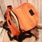 Preview: Rückseite der orangefarbenen Radltasche aus Nylon-Stoff mit Fokus auf das verstellbare Schulterband.