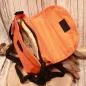 Preview: Rückseite der orangefarbenen Radltasche aus Nylon-Stoff mit Fokus auf das verstellbare Schulterband.