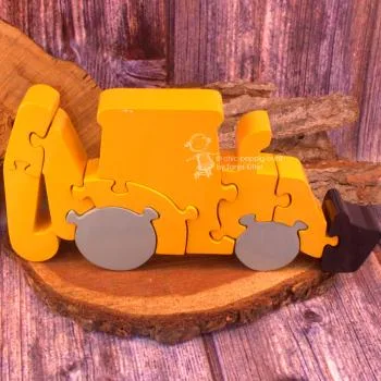 Zahlen Puzzle als Bagger in 3 D