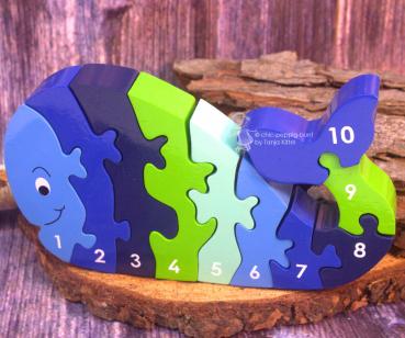 Blaues Puzzle als Wal in 3 D mit Zahlen