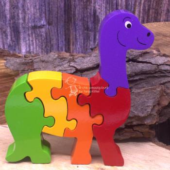 Zahlen Puzzle als bunter kleiner Dinosaurier