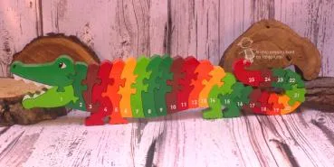 Holz Puzzle als Krokodil mit Zahlen von 1-25