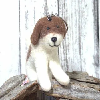 Taschenbaumler in braun gefleckt