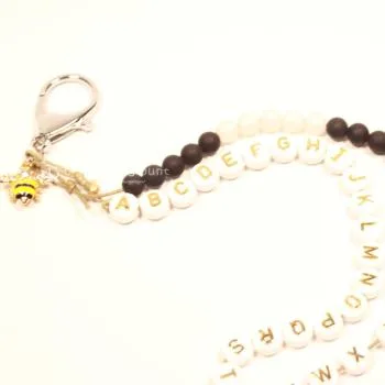 ABC Rechenkette Perlen schwarz-weiss vergoldet - abc rechenkette perlen schwarz weiss gold biene