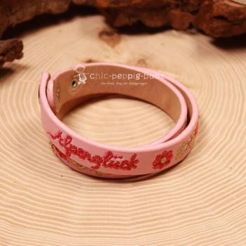 Zwei silberne Druckknöpfe zur Längenverstellung am 40 cm langen Trachtenaccessoire.