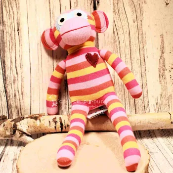 Mittlerer Sockenaffe von HickUps in Rosa, Pink und Gelb, handgefertigtes Fair Trade Stofftier, Größe 40 cm.