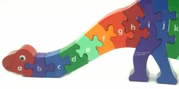 buntes Holz Puzzle in 3D als Dinosaurier