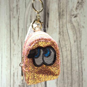 Glitzerndes Schlüsselanhänger Mäppchen mit Motiv in Aprikot-Rosa, Reißverschlussfach.
