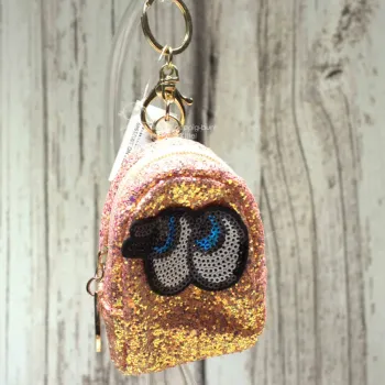 Glitzerndes Schlüsselanhänger Mäppchen mit Motiv in Aprikot-Rosa, Reißverschlussfach.