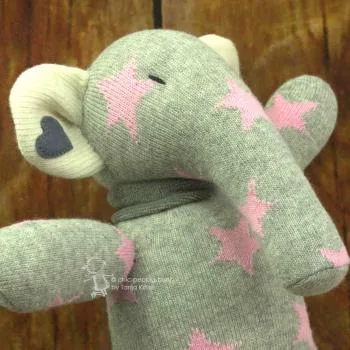 Kuscheltier Sockenelefant mit rosa Sternen