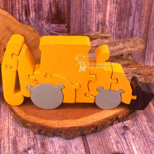 Zahlen Puzzle als Bagger in 3 D