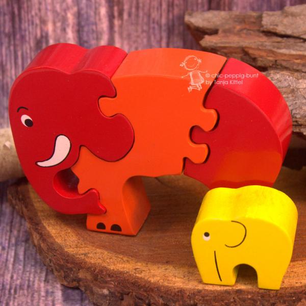 Roter Elefant mit Baby aus Holz