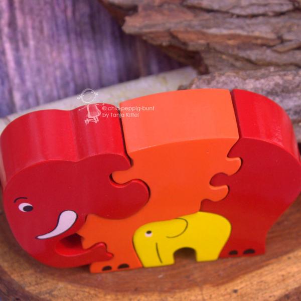 Holzpuzzle 3 D als Elefant mit Baby rot Holzpuzzle 3 D als Elefant mit Baby rot