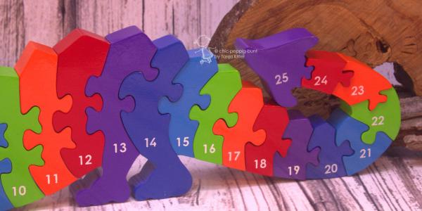 Buntes 3 D Puzzle als Drache mit Zahlen