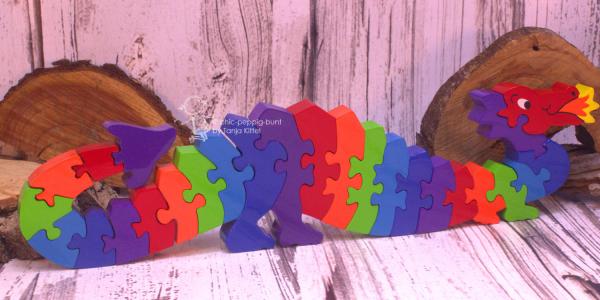 Drache als Puzzle aus Holz Drache als Puzzle aus Holz