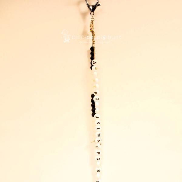 ABC Rechenkette Perlen schwarz-weiss vergoldet