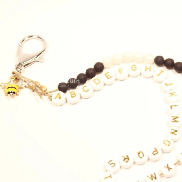 ABC Rechenkette Perlen schwarz-weiss vergoldet - abc rechenkette perlen schwarz weiss gold biene