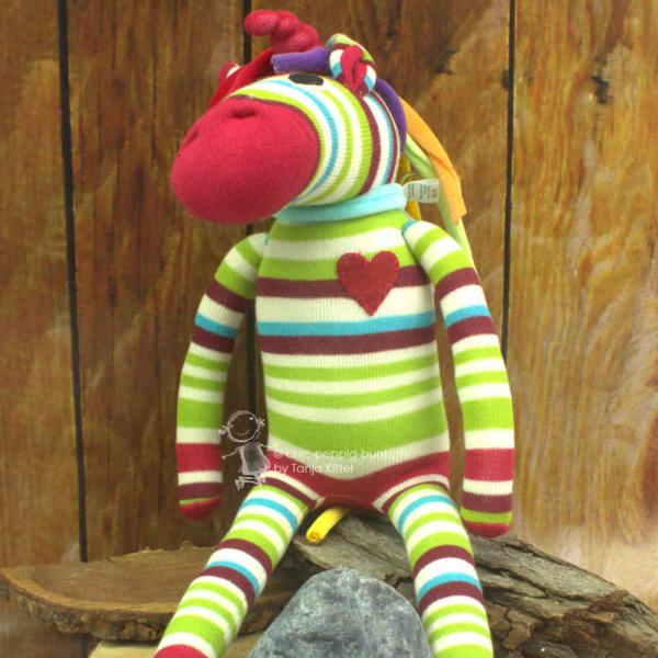 buntes Einhorn als Kuscheltier buntes Einhorn als Kuscheltier