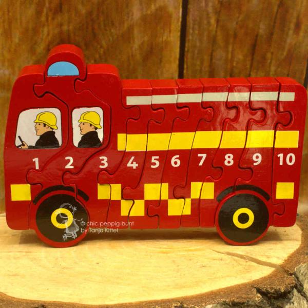 Zahlen Puzzle als Feuerwehr in 3 D Zahlen Puzzle als Feuerwehr in 3 D