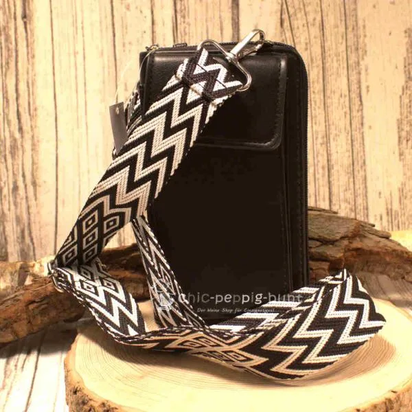 Stylische Handtasche aus langlebigem Kunstleder in schwarz Maße: 20x12x5 cm.