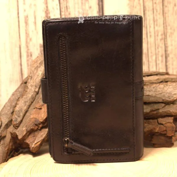 Detailansicht Portemonai unisex schwarzes Leder mit dekorativen Nieten und Außenreißverschluss.