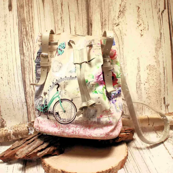 Beutel-Handtasche aus Kunstleder mit verstellbaren Schulterriemen, Innenfutter und separatem Handyfach vor neutralem Hintergrund.