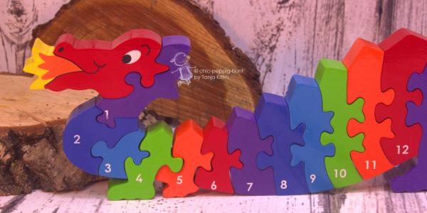 Holz Puzzle als Drachen mit Zahlen von 1-25
