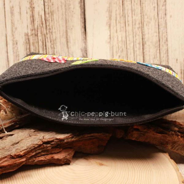 Stabiler Reißverschluss der weidräwöl Utensilientasche mit Blick auf die Handarbeit.