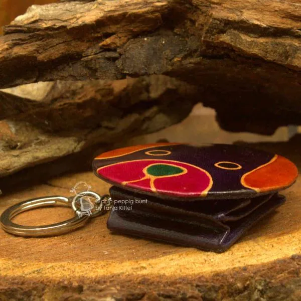 Münzfach als schlüsselanhänger