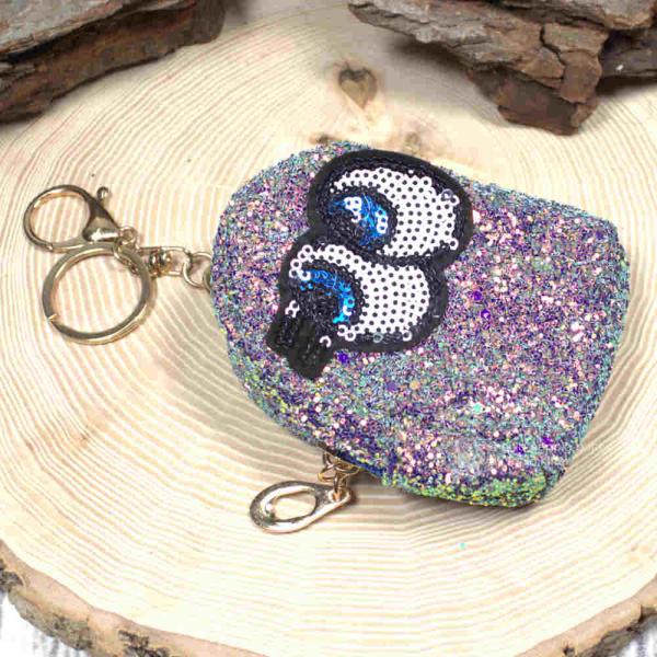 Glitzerndes Schlüsselanhänger Mäppchen in Hellblau mit buntem Augen-Motiv Glitzerndes Schlüsselanhänger Mäppchen in Hellblau mit buntem Augen-Motiv