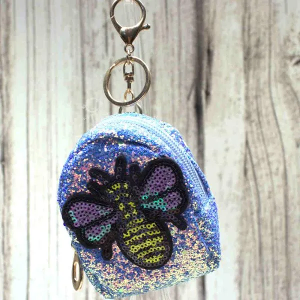 Kompaktes Schlüsselanhänger Mäppchen blau glitzernd, 10x6x4 cm, mit 17 cm hohem Schlüsselring.