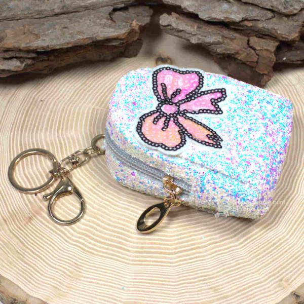 Glitzerndes Schlüsselanhänger Mäppchen mit Motiv (z.B. Schleife), 10x6x4 cm Utensilientasche mit Reißverschluss zum Verkaufen. Glitzerndes Schlüsselanhänger Mäppchen mit Motiv (z.B. Schleife), 10x6x4 cm Utensilientasche mit Reißverschluss zum Verkaufen.